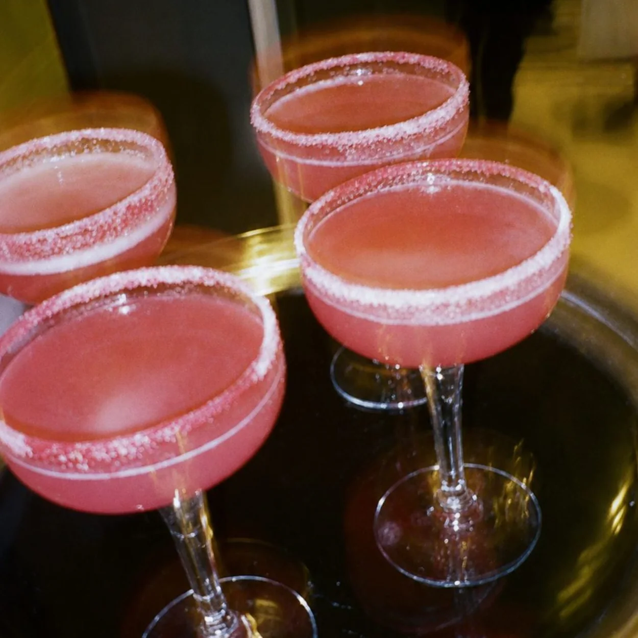 St Martins Lane pink cocktails in sugar-rimmed coupes