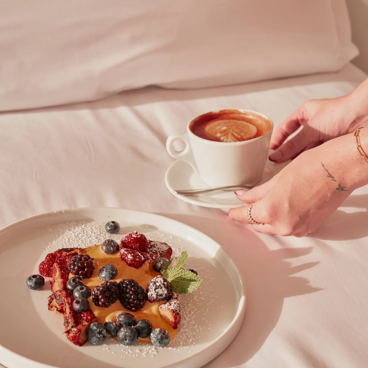 St Martins Lane breakfast in bed with berries and coffee