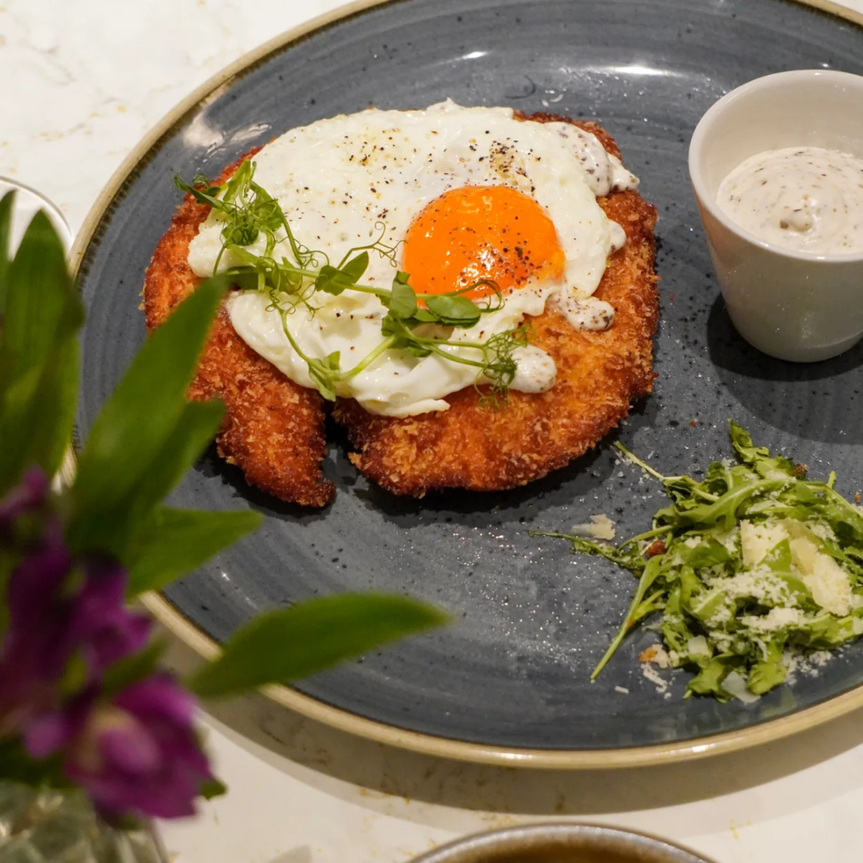 Strand Palace schnitzel with fried egg and chips at Haxells