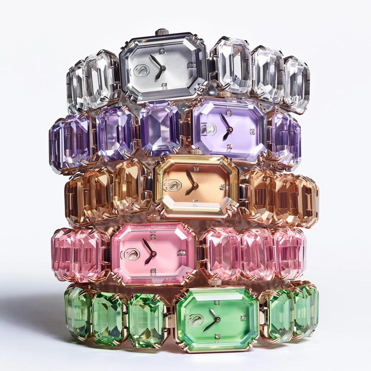 Swarovski crystal watches in five colours stacked together