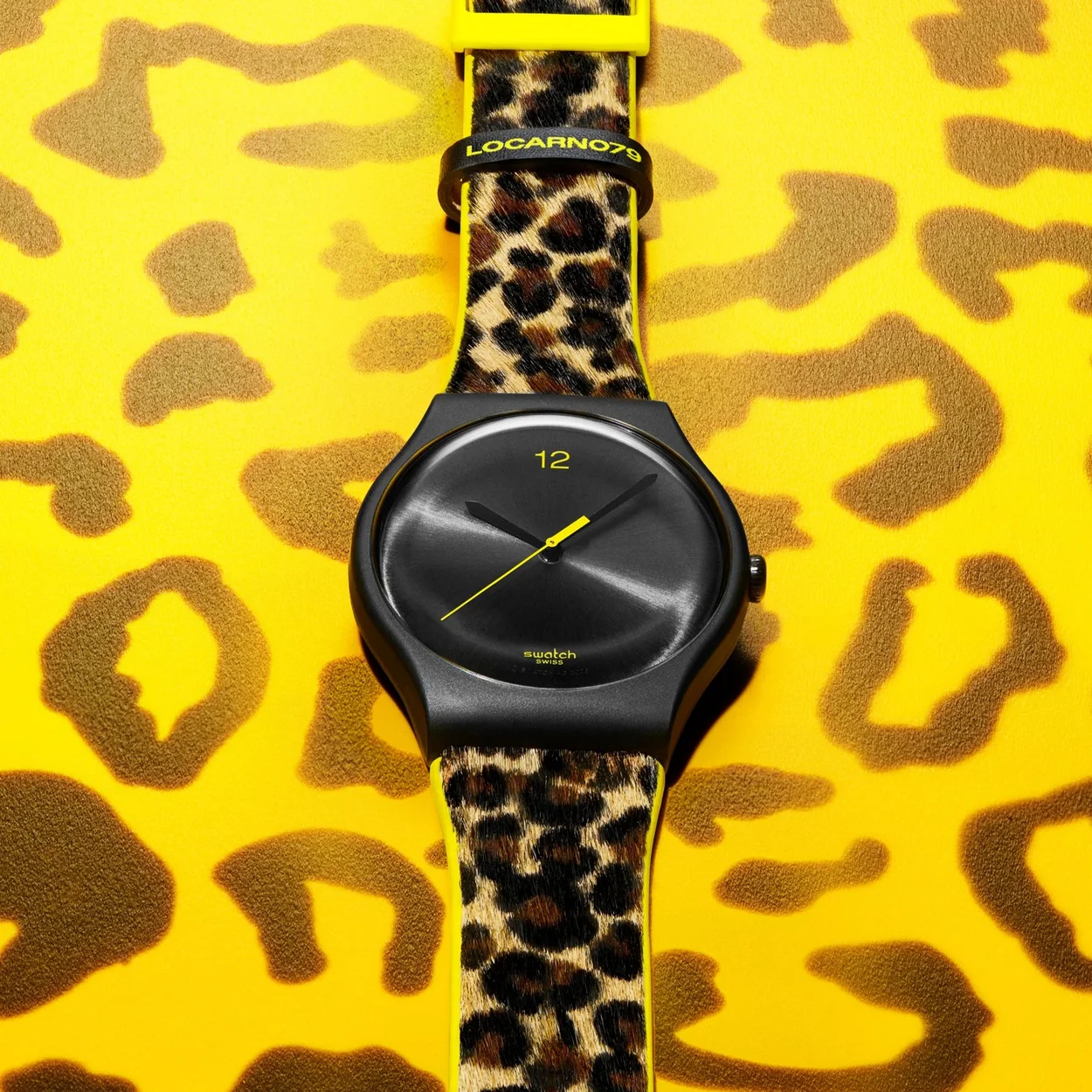 Swatch black watch with leopard print strap