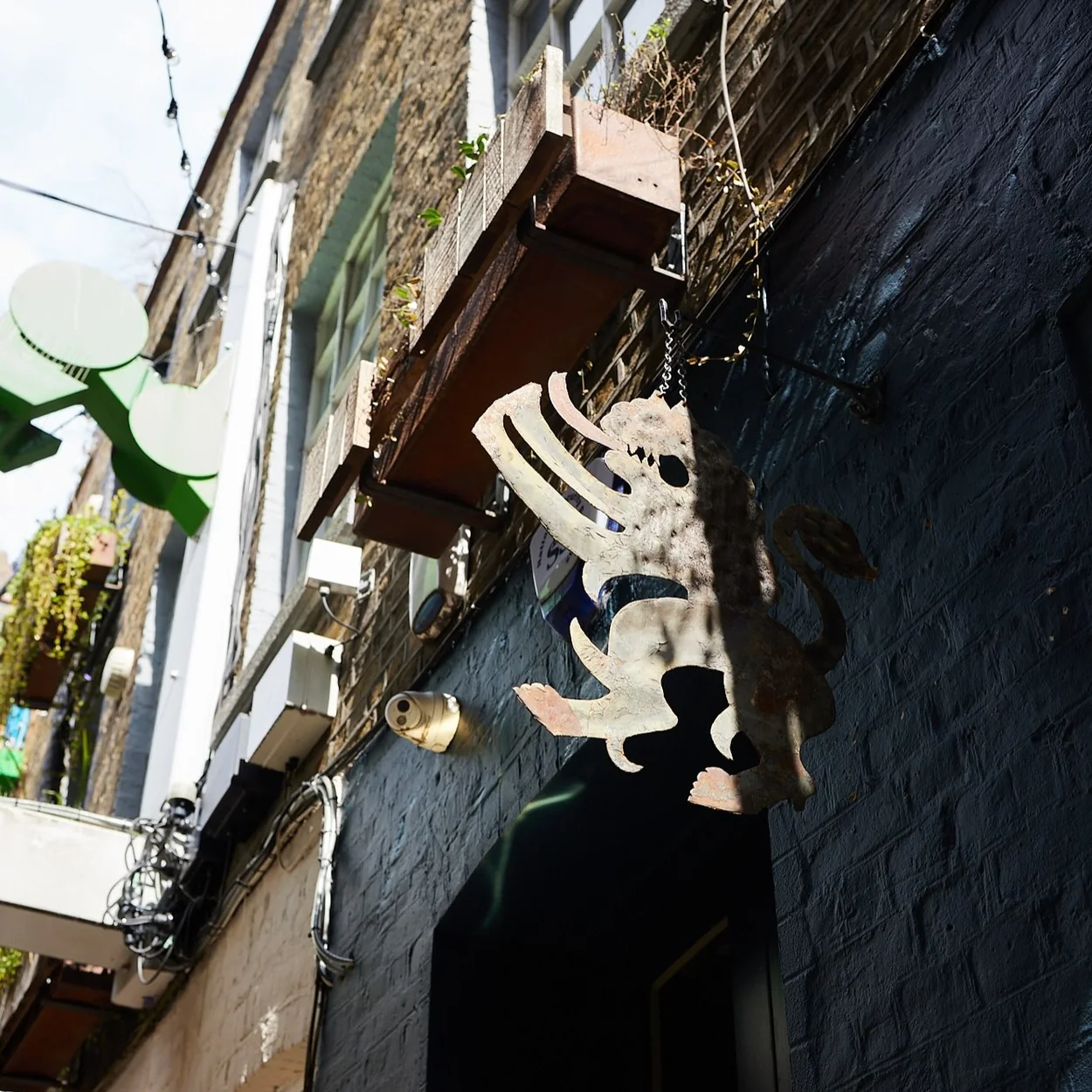 The Barbary exterior and hanging sign in Neal's Yard