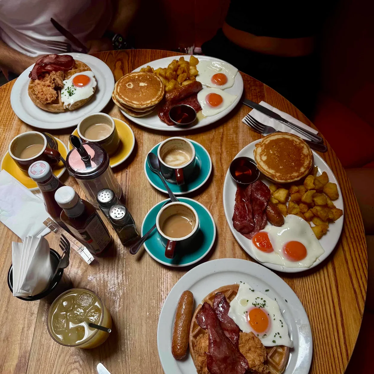 The Breakfast Club table of cooked breakfasts and coffees