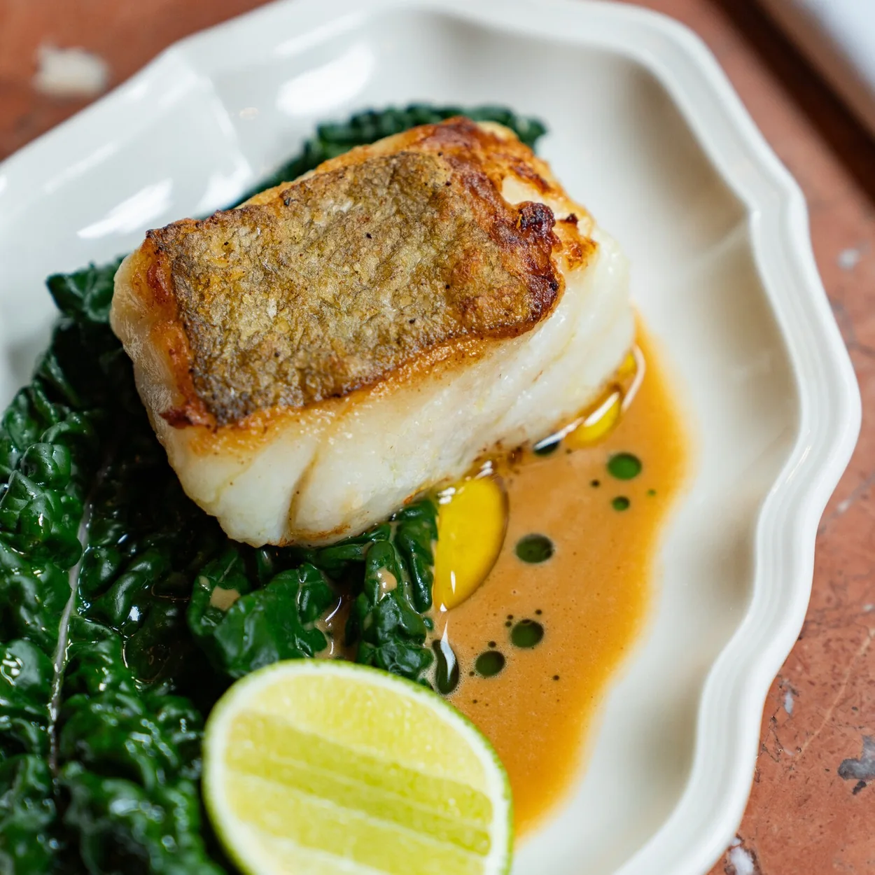Henrietta Hotel dish of roast fish with greens at Henri restaurant