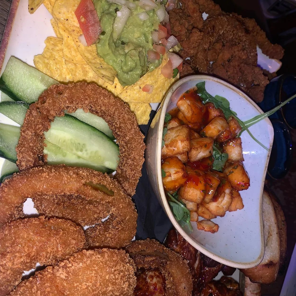 The Long Acre sharing platter with onion rings and wings