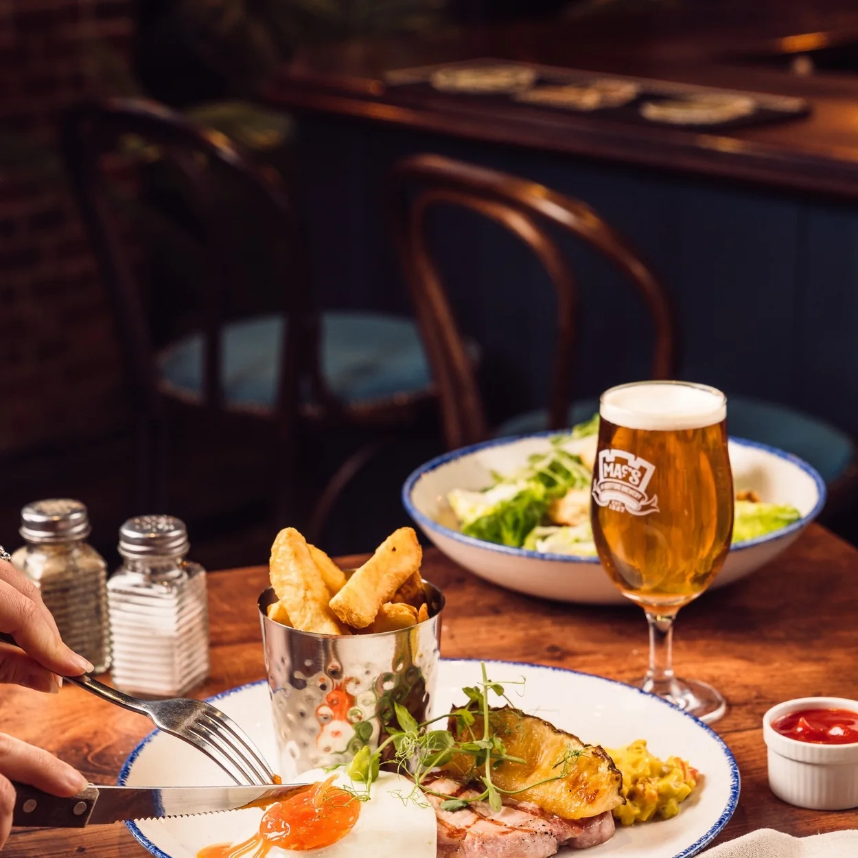 The Nags Head pub meal served with a pint of lager