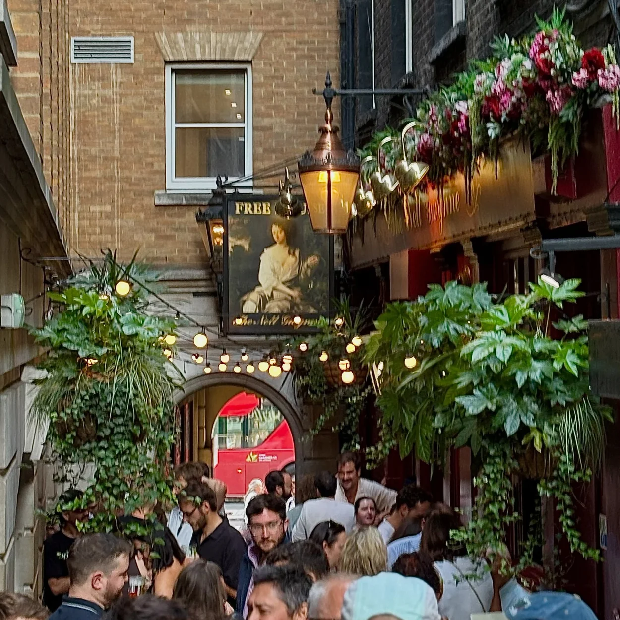 The Nell Gwynne Tavern drinkers gathered in Bull Inn Court