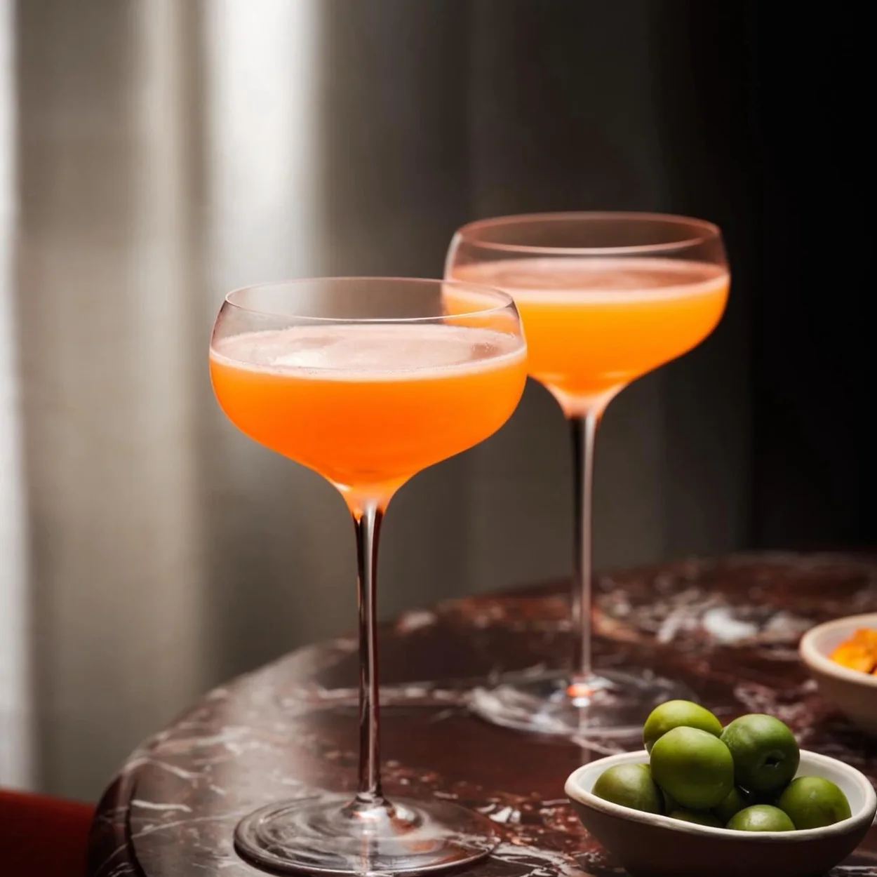 NoMad London cocktails in coupe glasses at Side Hustle bar