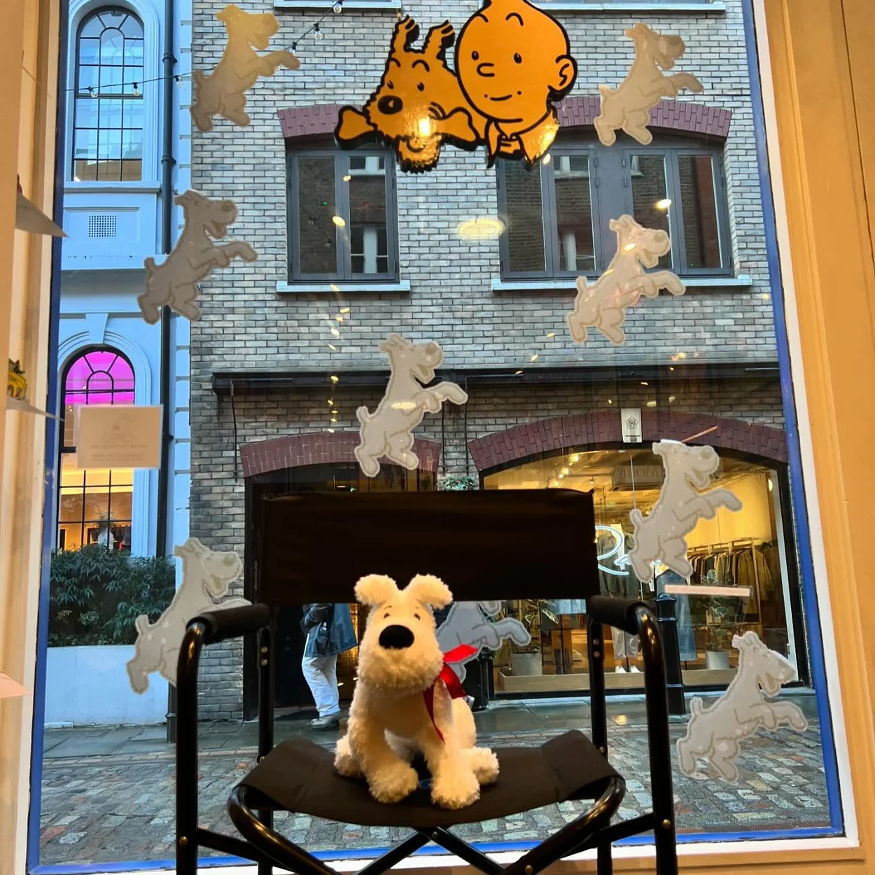 The Tintin Shop window with Snowy plush and Tintin figures