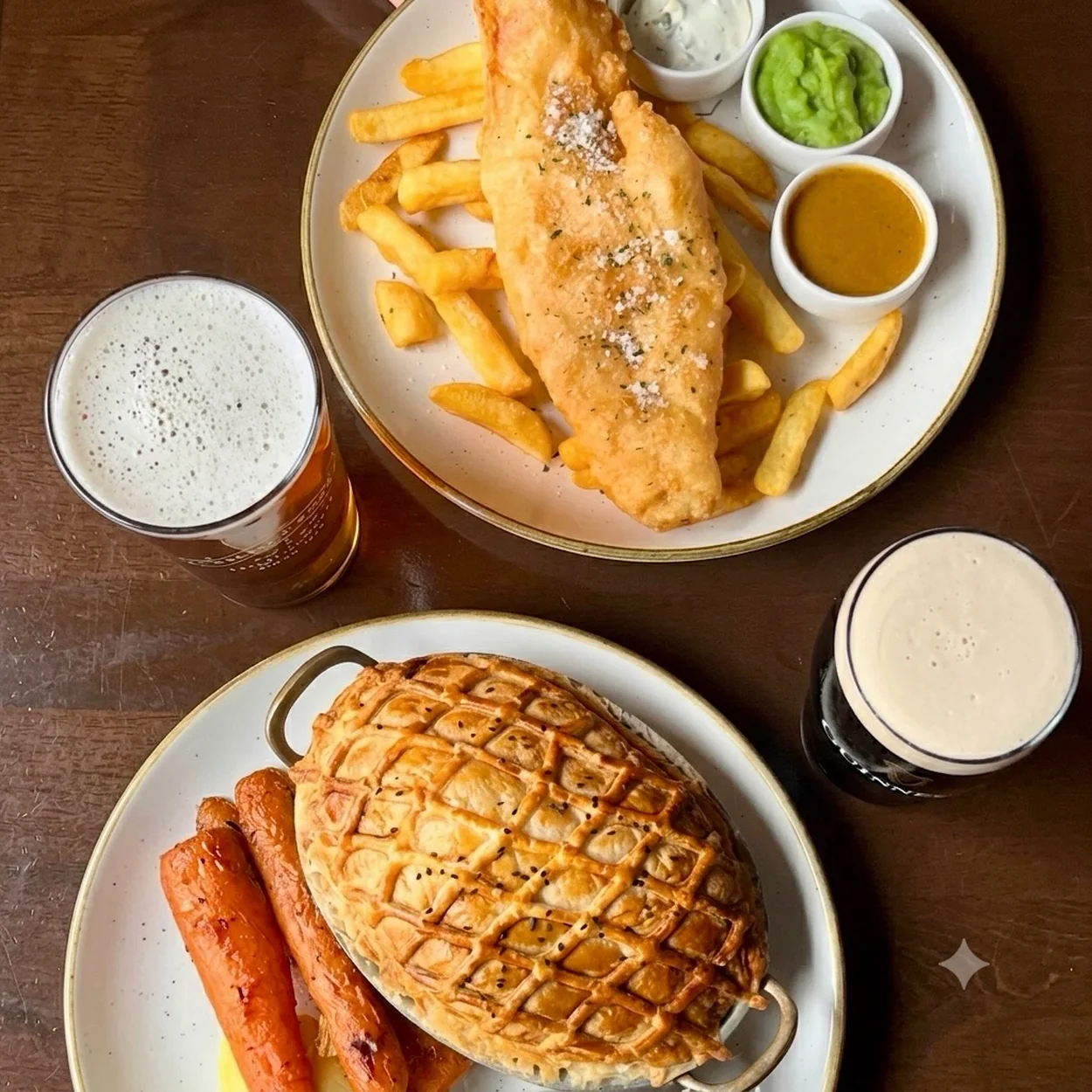 The White Lion pie and fish and chips served with pints of ale