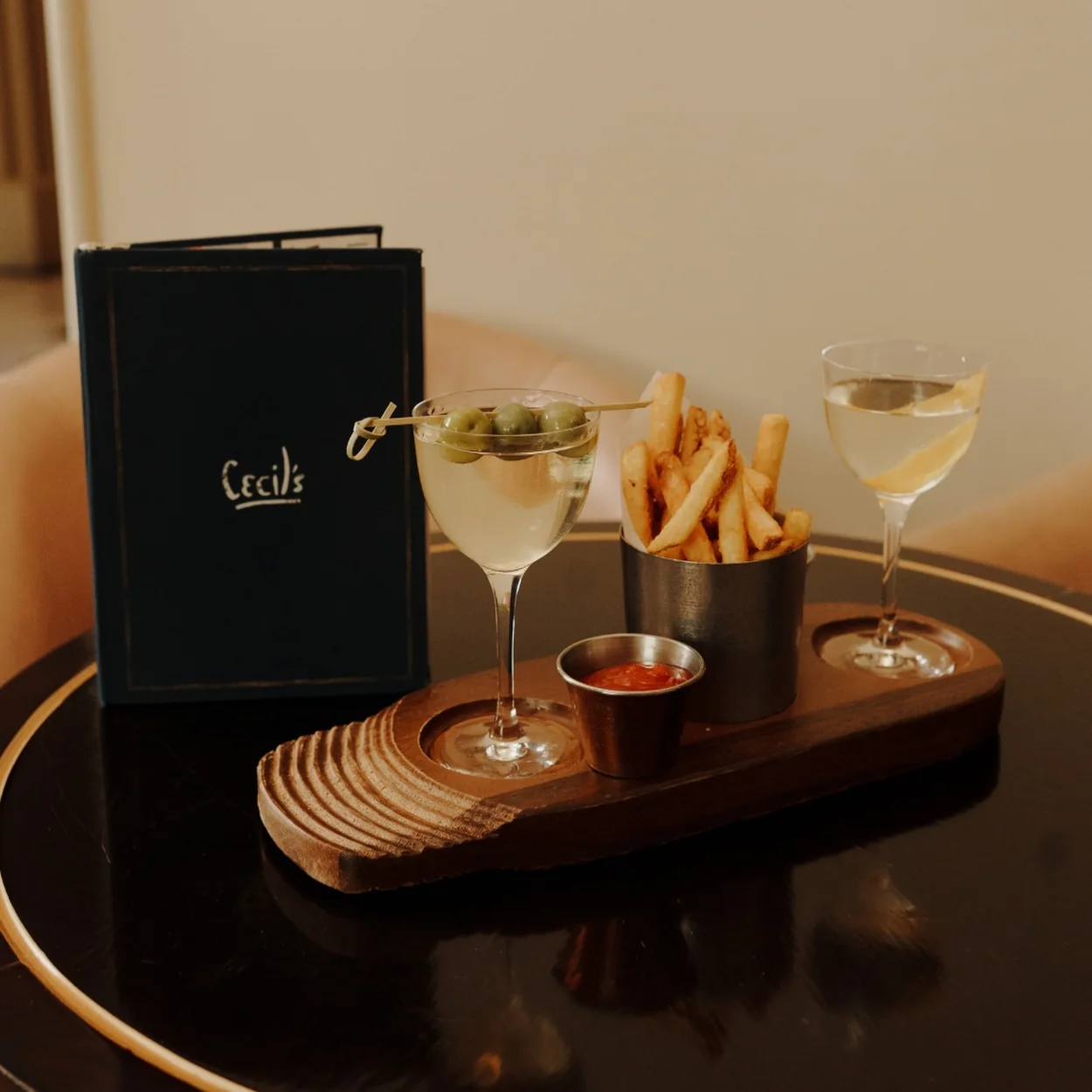 Theatre Royal Drury Lane bar serving with cocktails and fries at Cecil Beaton bar