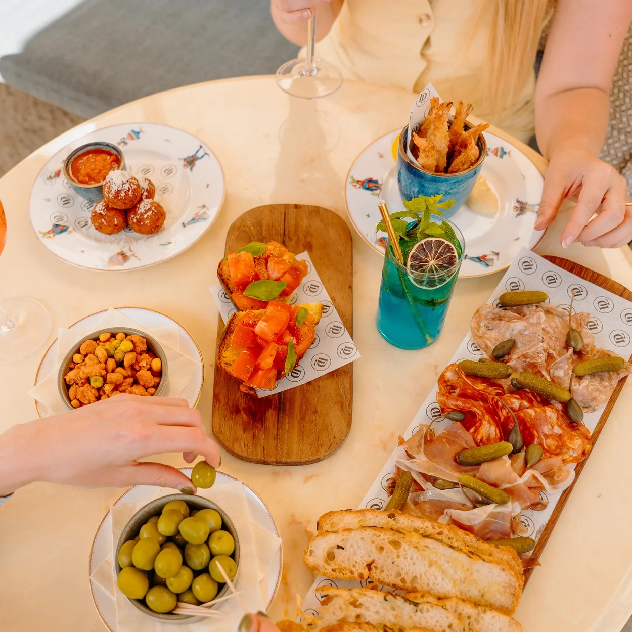 Theatre Royal Drury Lane sharing plates and drinks on the terrace