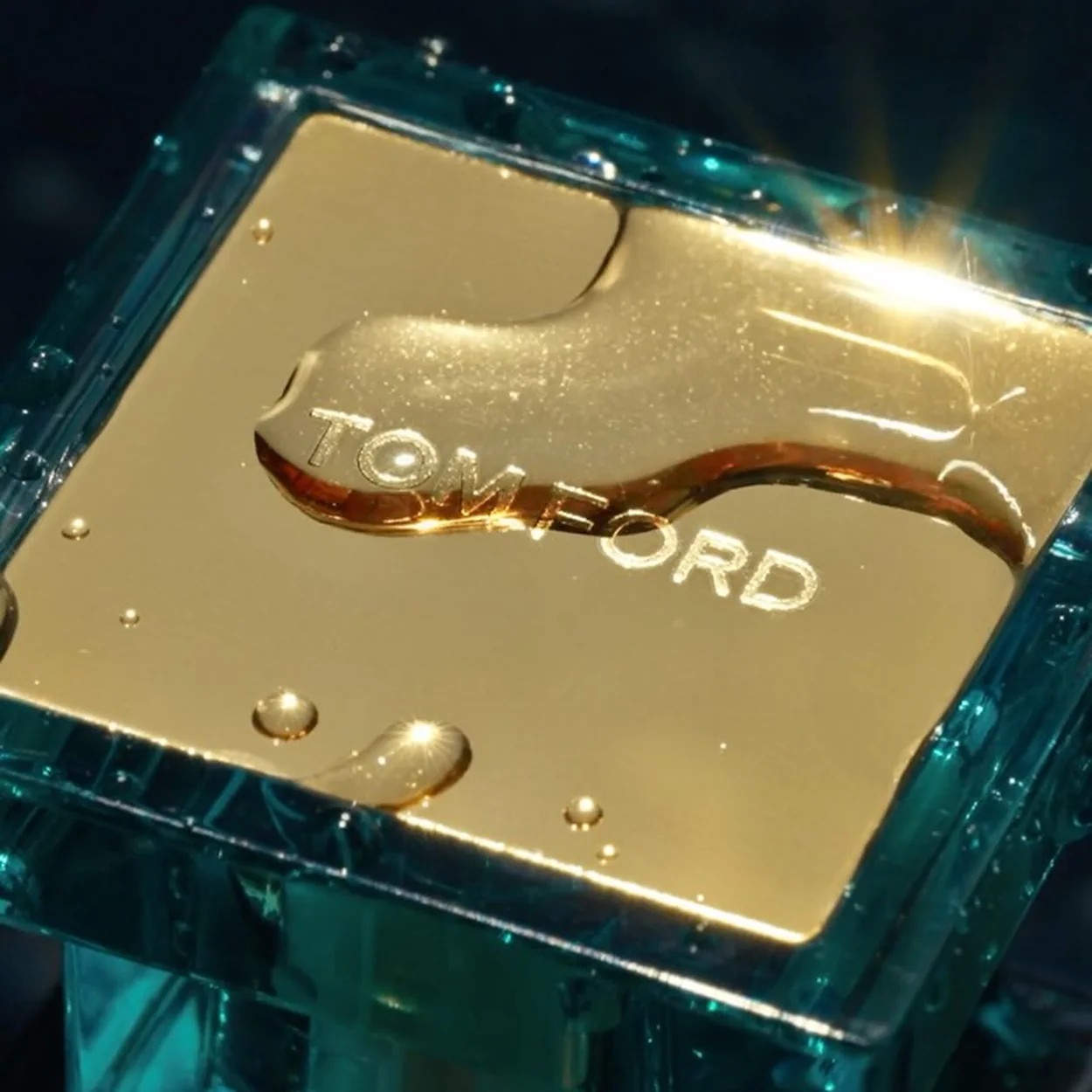 Tom Ford Beauty gold compact with water droplets