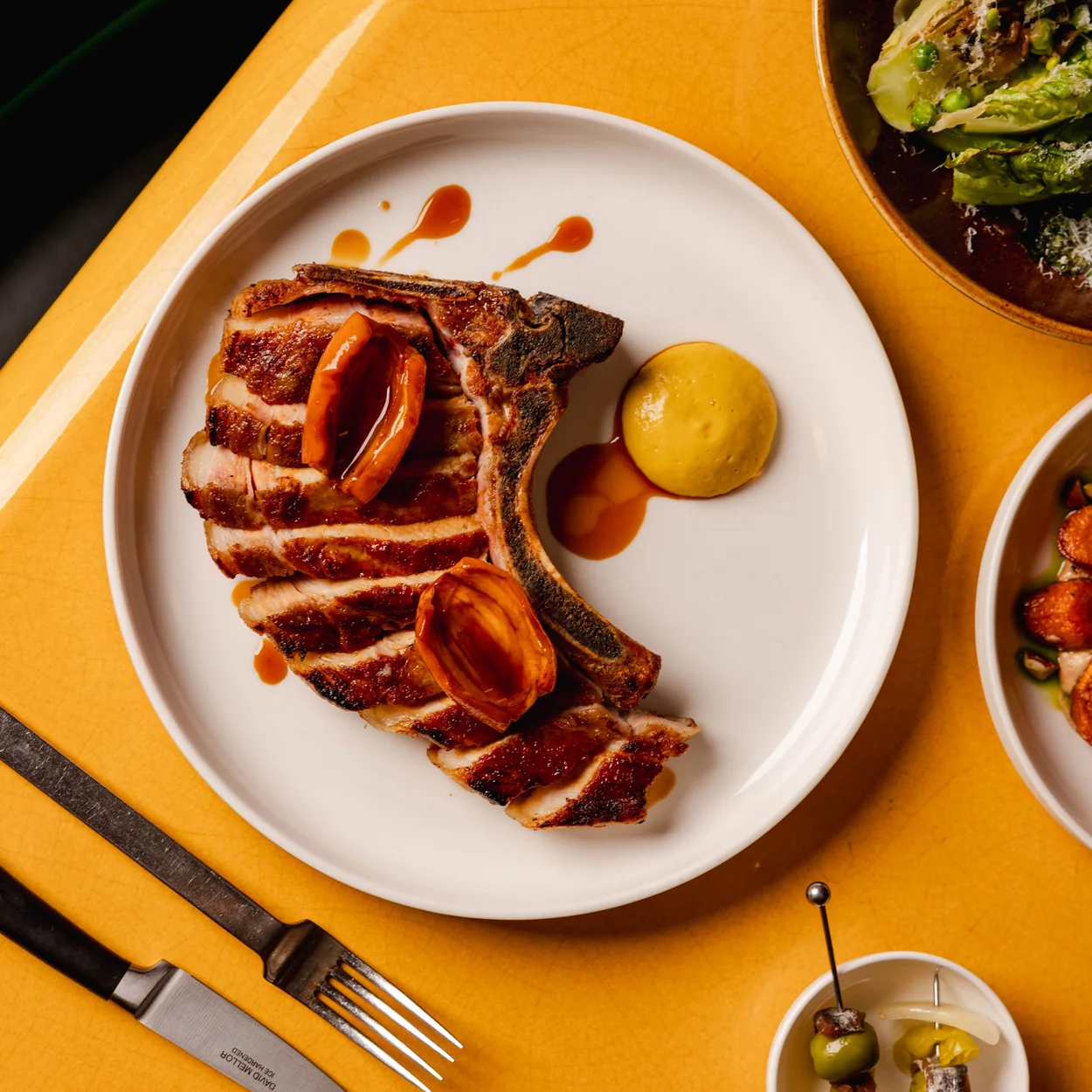 Town restaurant pork chop with mustard and greens
