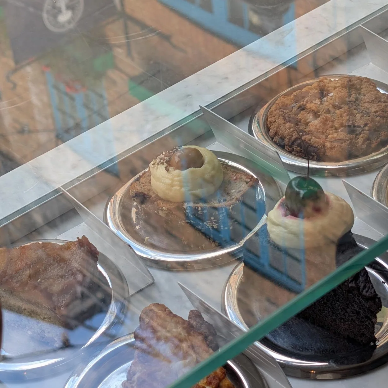 26 Grains pastry counter with cakes and bakes on display