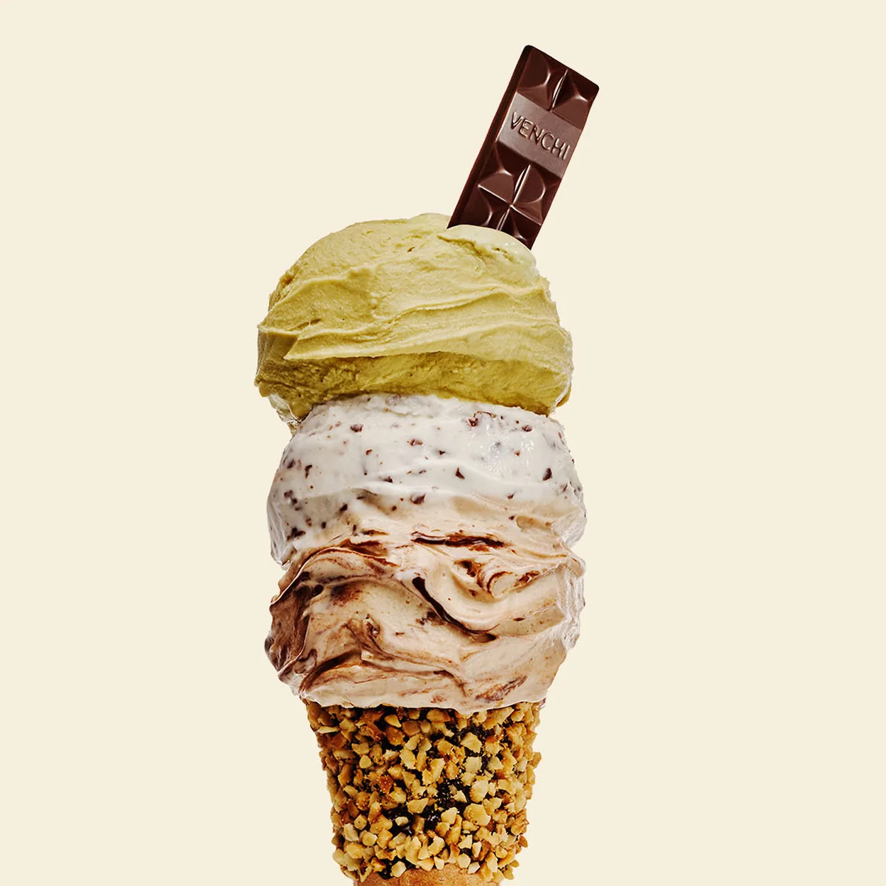 Venchi pistachio and stracciatella gelato in a hazelnut-dipped cone