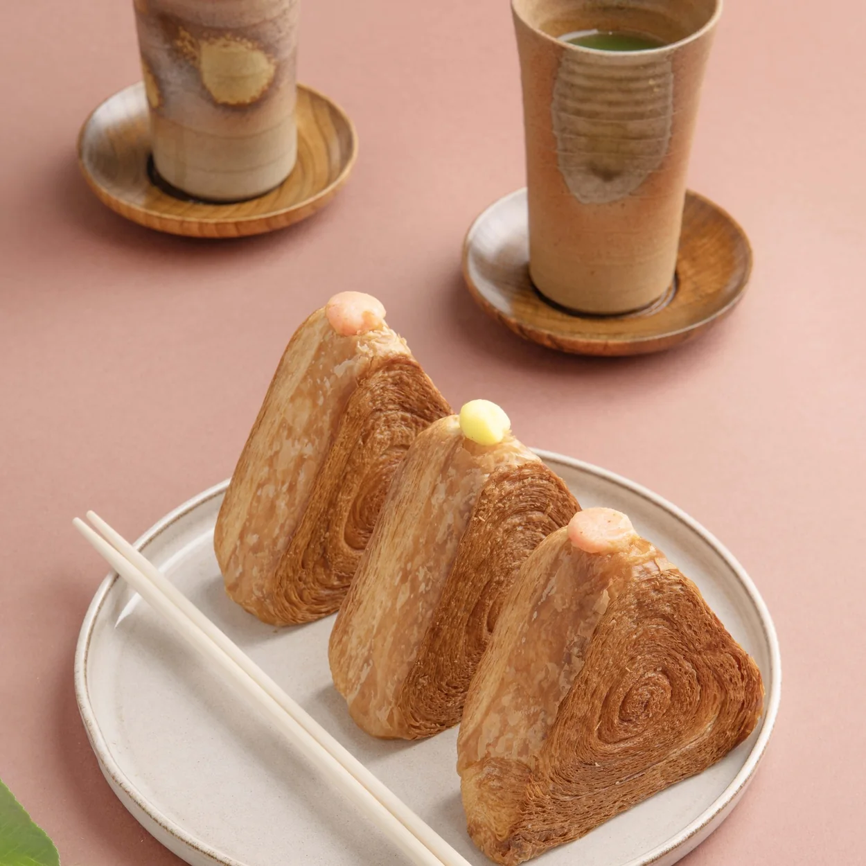 WA Bakery laminated croissant triangles served with green tea