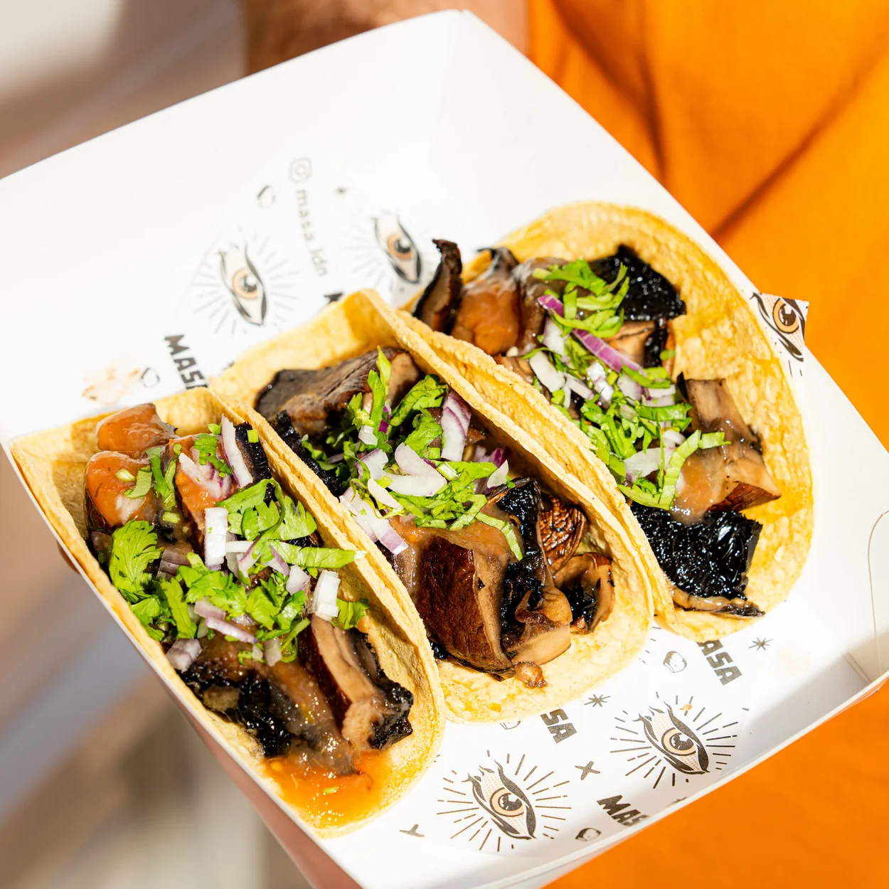 Takeaway box of MASA Tacos
