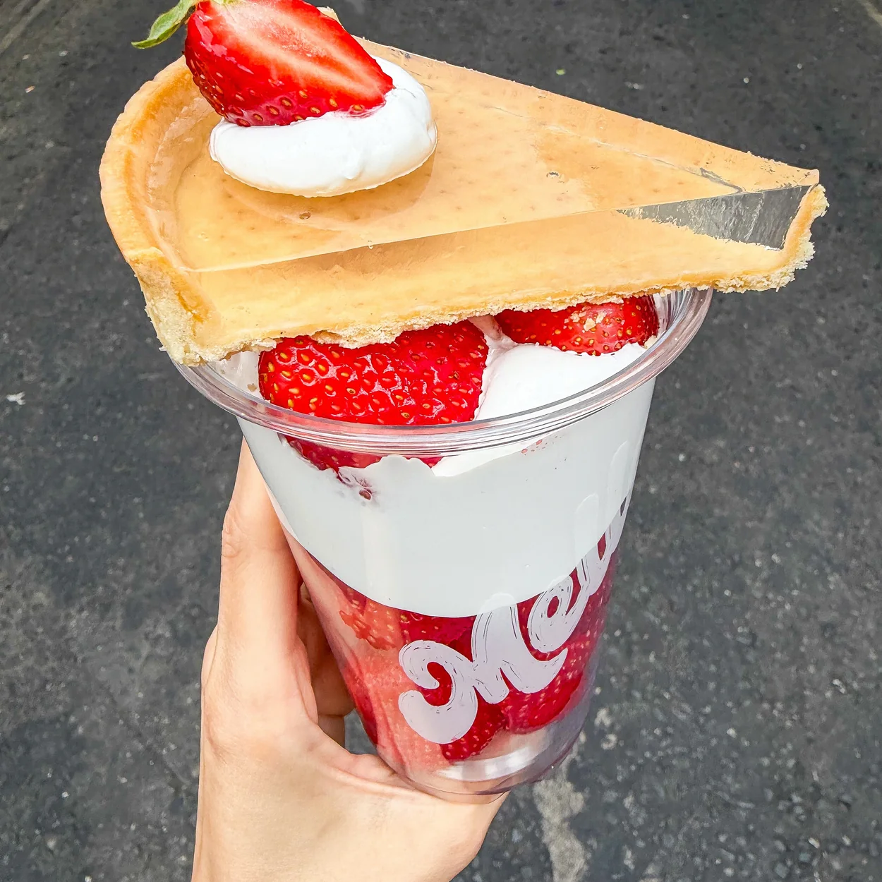 Mello Deluxe strawberry dessert cup with a waffle wafer