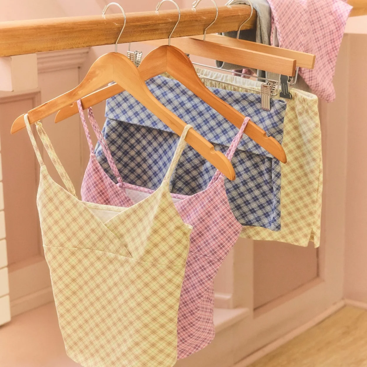 Patterned tote bags hanging on a rail at Urban Outfitters